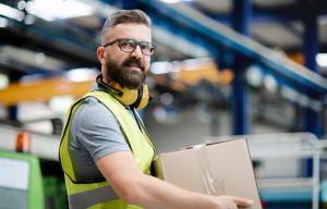 man-worker-working-in-industrial-factory-or-wareho-JDKYP5C