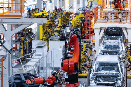 Automotive production line. Welding car body. Modern car Assembly plant Automotive Fulfillment